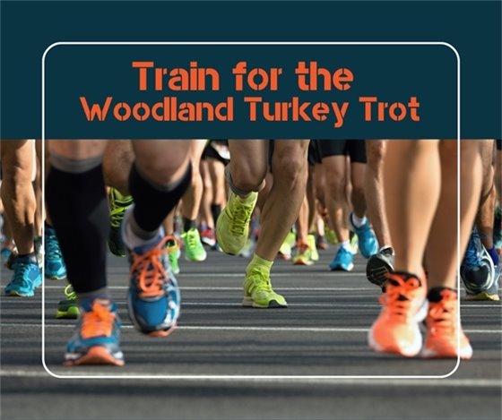 Photo of runners' shoes with the text "train for the Woodland turkey trot"