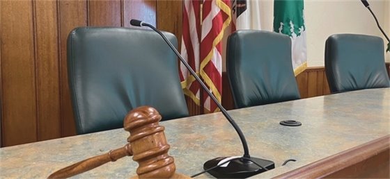 Image of City Council dias with gavel in the foreground