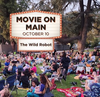 Photo of a past Movie on Main event with the text "Movie on Main October 10: The Wild Robot"