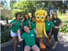 Teens posing with Tweety Bird