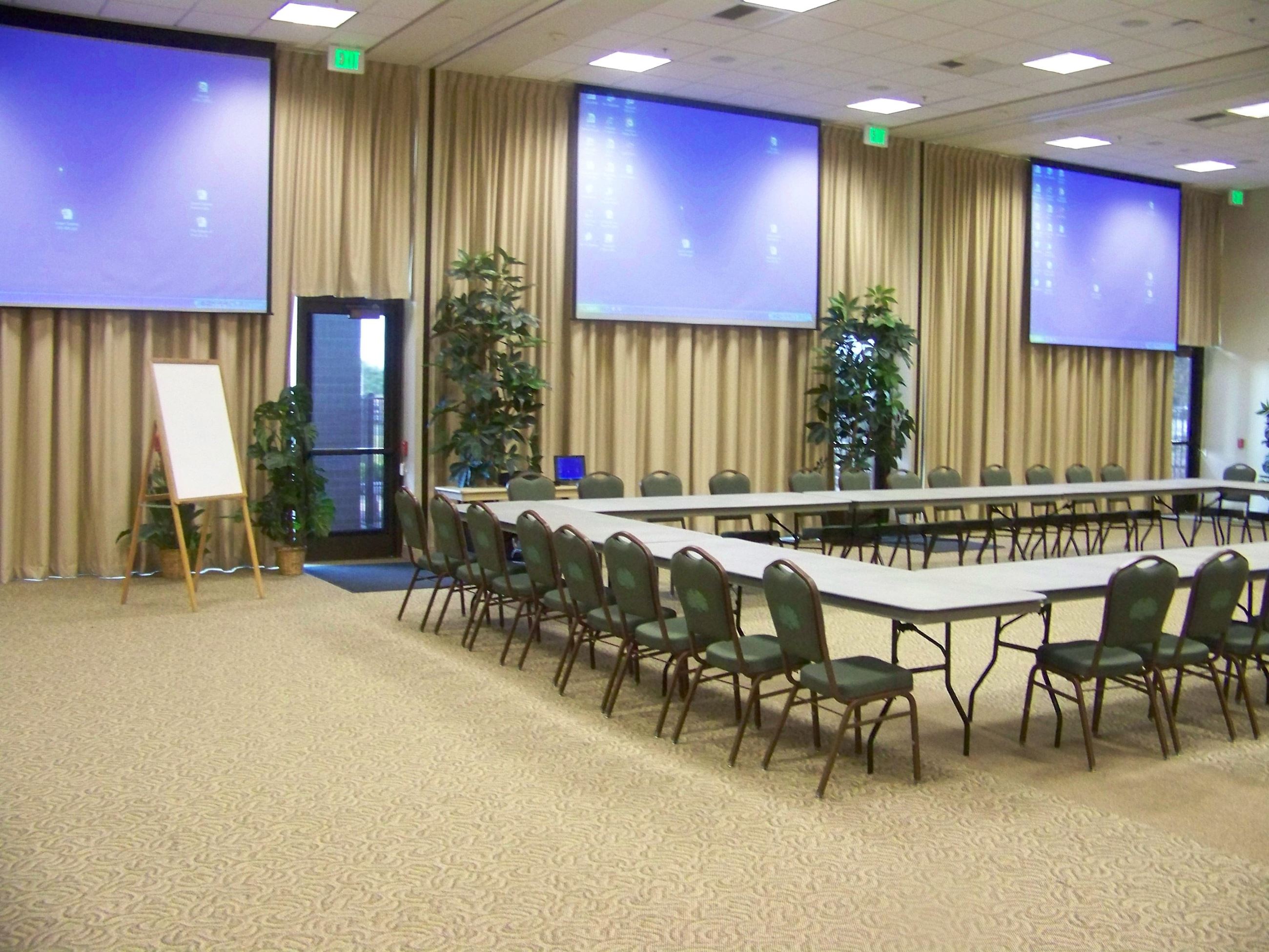 Community & Senior Center Meeting Room showing chairs and screens