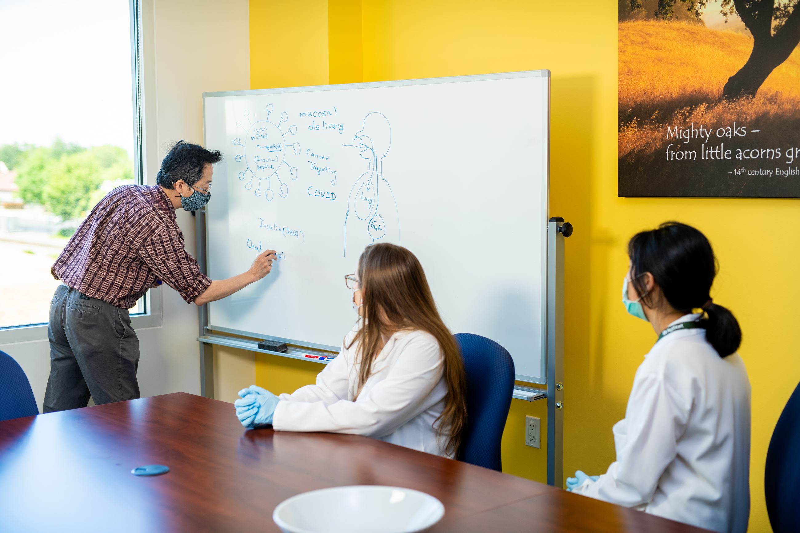 People gathered in AgStart conference room